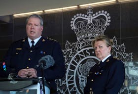 RCMP Chief Supt. Chris Leather speaks to media Sunday about a 12-hour shooting rampage by Gabriel Wortman that left at least 13 people dead. At Leather's side is Assistant Commissioner Lee Bergerman, the RCMP's commanding officer for Nova Scotia.