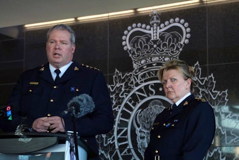 RCMP Chief Supt. Chris Leather speaks to media Sunday about a 12-hour shooting rampage by Gabriel Wortman that left at least 13 people dead. At Leather's side is Assistant Commissioner Lee Bergerman, the RCMP's commanding officer for Nova Scotia.
