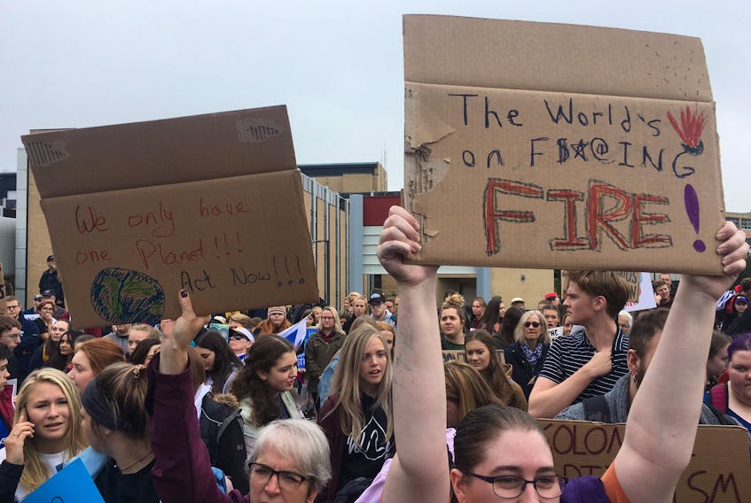 People gather in St. John's, N.L., on Friday, Sept. 27, 2019 to rally against the global climate crisis.