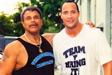 A chip off the old rock: Amherst native and WWE Hall of Famer Rocky Johnson and his son, Dwayne (the Rock) Johnson.