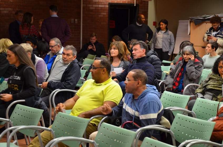 People gather at the Halifax North Public Library on Monday evening, Nov. 18, 2019 for a conversation about what happens in the aftermath of the street check ban.