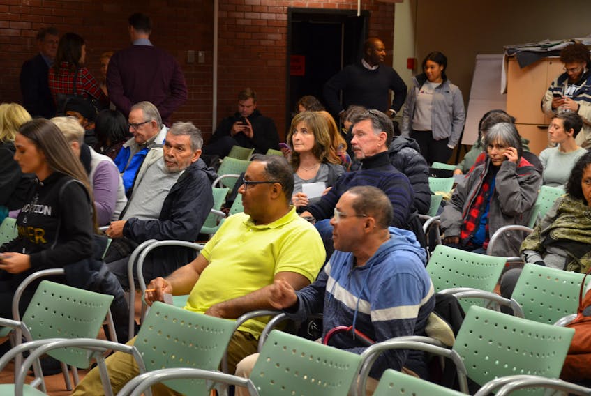People gather at the Halifax North Public Library on Monday evening, Nov. 18, 2019 for a conversation about what happens in the aftermath of the street check ban.
