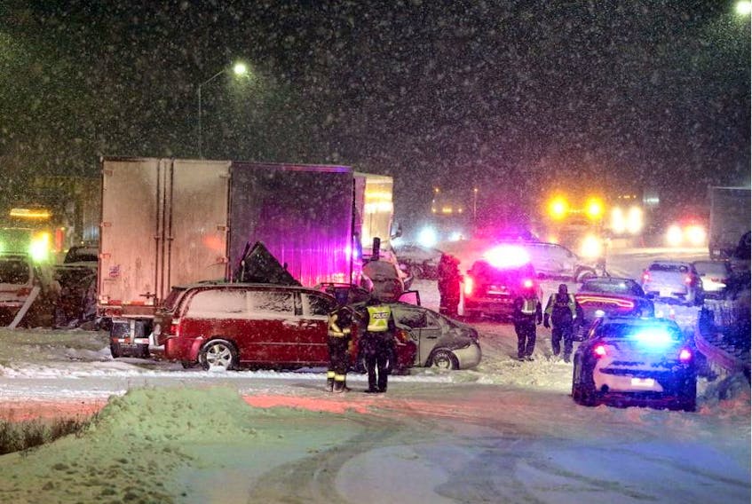 A pileup on Highway 401 westbound between Montreal Street and Highway 15 in Kingston on Sunday afternoon involved an estimated 30 to 40 vehicles, killing one person and injuring 16 others. - Meghan Balogh / Postmedia