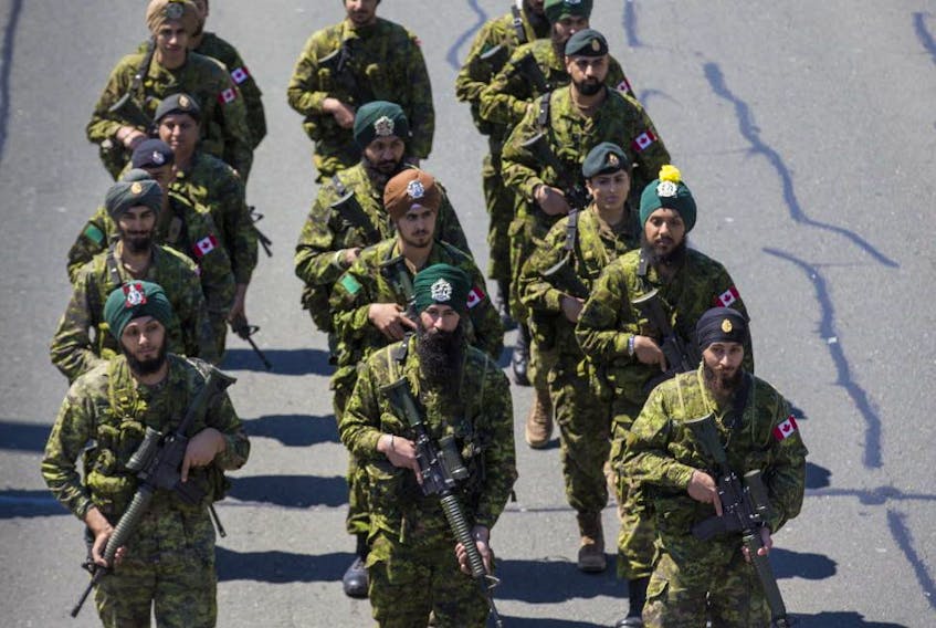Members of the Canadian Forces make their way along Lake Shore Boulevard West in Toronto as a part of the Khalsa Day celebration on April 28, 2019. - 
 Ernest Doroszuk / Toronto Sun