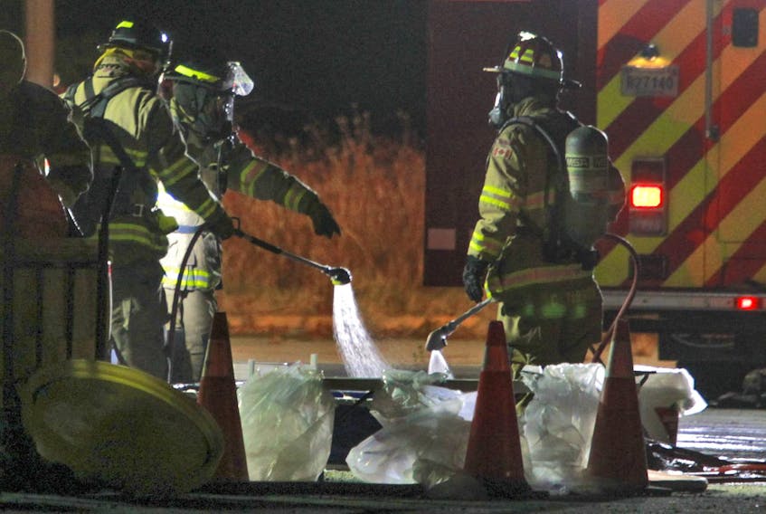 Halifax regional firefighters are seen at a hazardous materials call in the 500 block of Portland Street, behind the Sobeys store, in Dartmouth on Thursday, Nov. 21, 2019.
