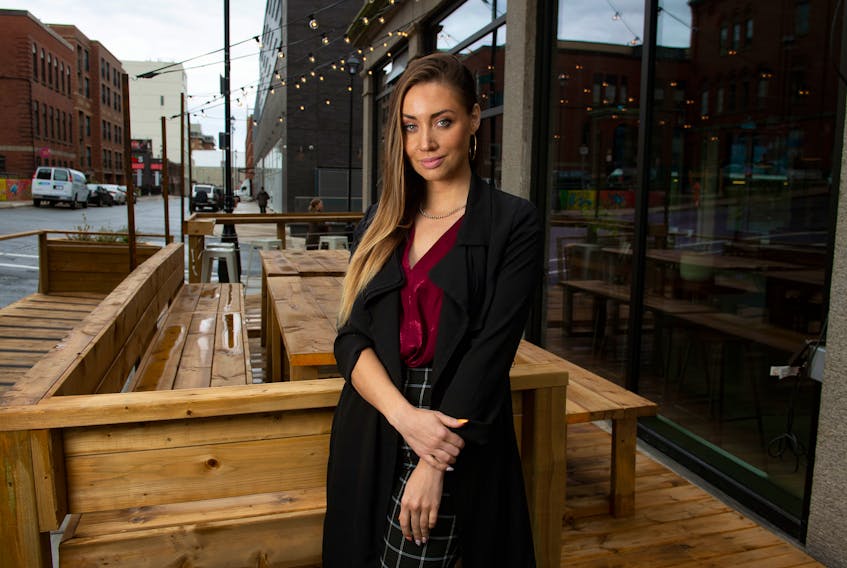 Caley Dimmock, outside Boxcar Social in downtown Halifax on Oct. 8, 2019, is organizing a fundraising campaign through social media for mental health.