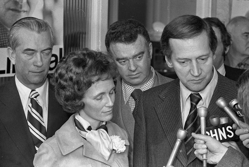 Gerald Regan, accompanied by his wife Carole, speaks to reporters at his campaign headquarters in Halifax on provincial election day, April 2, 1974. His party won a majority. - Chronicle Herald archives