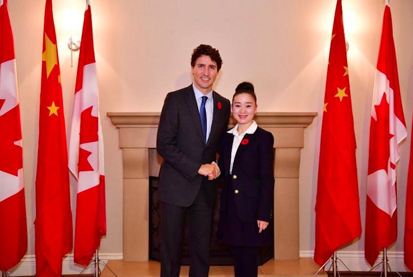 Prime Minister Justin Trudeau, left, and Karen Wang 