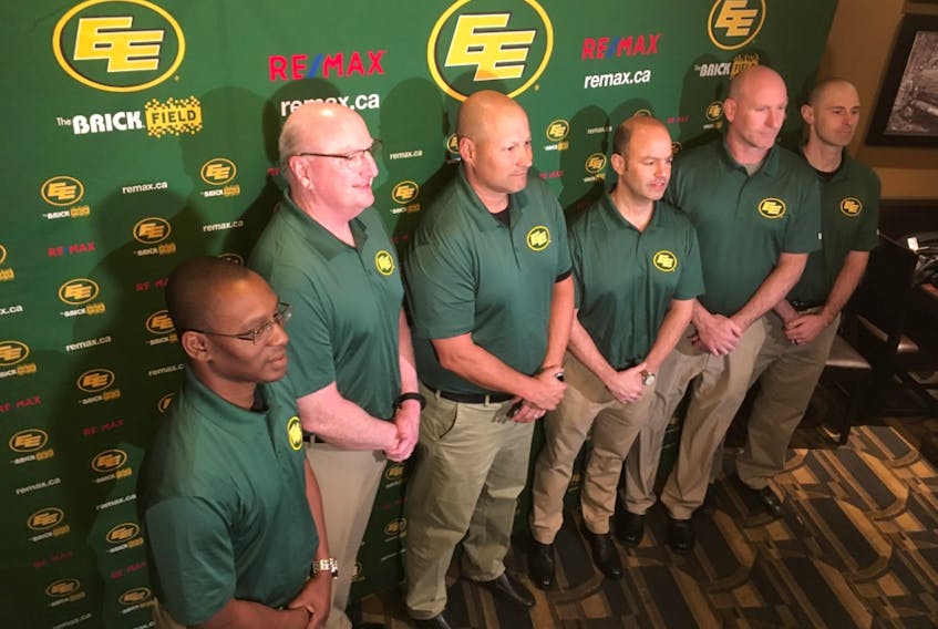 Edmonton Football Team head coach Scott Milanovich (third from left) announces his coaching staff, including (from left): Receivers coach Winston October, offensive-line coach John McDonnell, Milanovich, defensive co-ordinator Noel Thorpe, special-teams co-ordinator A.J. Gass and defensive assistant Derek Oswalt, at the Sawmill restaurant in Sherwood on Jan. 15, 2020.