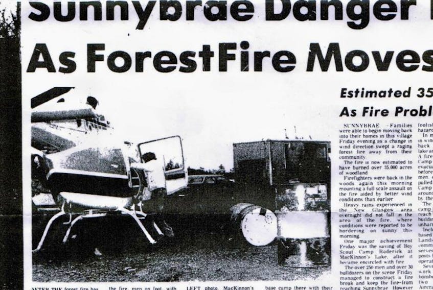 <p>An Evening News newspaper clipping during the Trafalgar fire in 1976 shows a base camp that the Department of Lands and Forests had set up.</p>