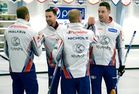 The Brad Gushue rink, including (from left) Geoff Walker, Gushue, Mark Nichols and Brett Gallant celebrate after defeating Trent Skanes’ team 3-1 in Sunday’s final of the 2020 Newfoundland and Labrador men’s curling championship at the Re/Max Centre in St. John’s. It’s Gushue’s 15th Tankard win, a 12th for Nichols, the seventh for Walker and Gallant’s sixth. — Keith Gosse/The Telegram