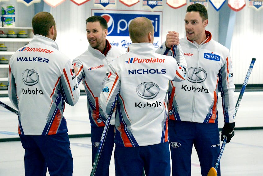 The Brad Gushue rink, including (from left) Geoff Walker, Gushue, Mark Nichols and Brett Gallant celebrate after defeating Trent Skanes’ team 3-1 in Sunday’s final of the 2020 Newfoundland and Labrador men’s curling championship at the Re/Max Centre in St. John’s. It’s Gushue’s 15th Tankard win, a 12th for Nichols, the seventh for Walker and Gallant’s sixth. — Keith Gosse/The Telegram
