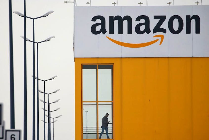  The logo of Amazon is seen at the company logistics center in Lauwin-Planque, northern France, March 19, 2020.