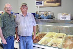 From left, Bonnar's Meats owner Albert Bonnar and employee Ronnie Gardiner in this 2017 photo. The Northside shop will be celebrating 26 years in business in May. CAPE BRETON POST 