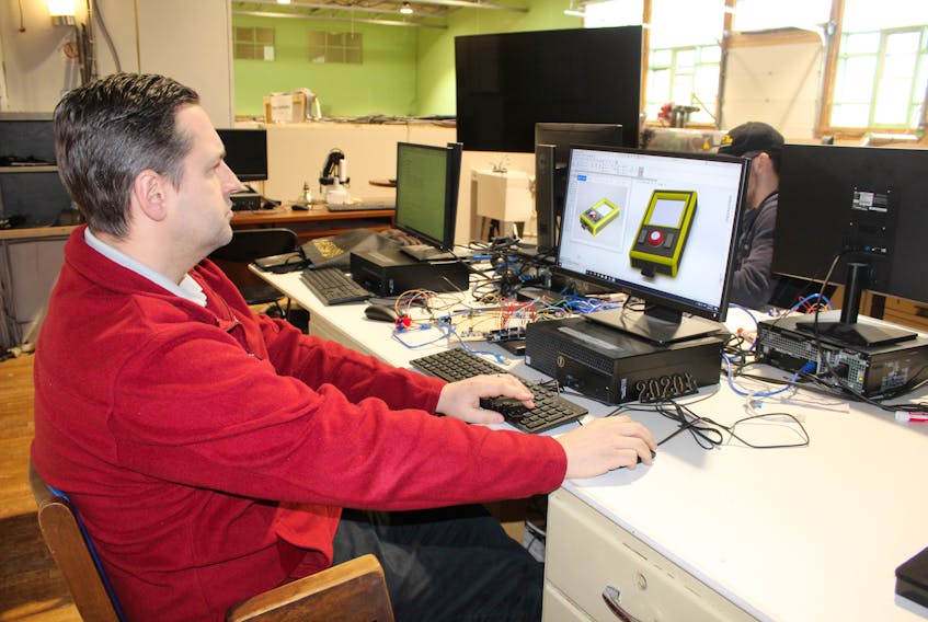 Matt Swann, director of the Nova Scotia Power MakerSpace, demonstrates the SoldWorks design software found in the MakerSpace on Nepean Street, Sydney. Designs are created with the software and then the files transferred to other equipment on site. GREG MCNEIL/CAPE BRETON POST