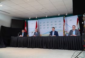 P.E.I Premier Dennis King, second from right, and members of cabinet address media during a briefing on Monday, March 30, in Charlottetown. From left are Economic Growth and Tourism Minister Matthew MacKay, Social Development and Housing Minister Ernie Hudson, King and Transportation, Infrastructure and Energy Minister Steven Myers.