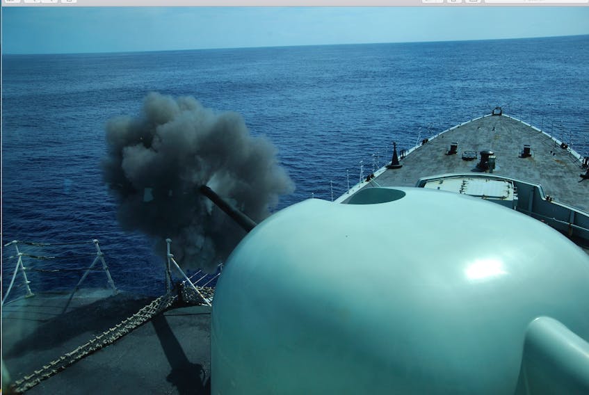 Photo above shows the 76mm gun on HMCS Iroquois firing during an exercise in 2008. DND photo
