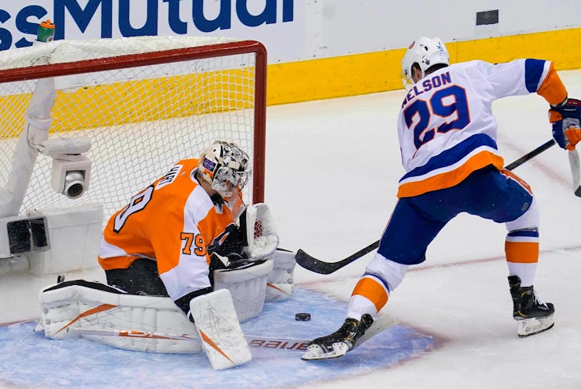 Philadelphia Flyers goaltender Carter Hart (79) makes a save against New York Islanders center Brock Nelson (29) during the second period in Game 7 of the second round of the 2020 Stanley Cup Playoffs at Scotiabank Arena on Aug. 6, 2020. 