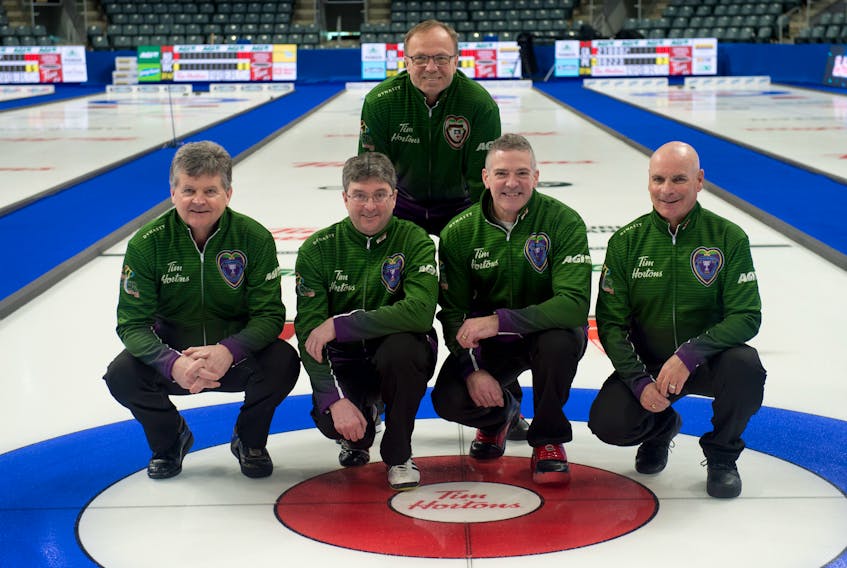 Team P.E.I. is ready for the Tim Hortons Brier in Kingston, Ont. Kneeling, from left, are skip Bryan Cochrane, third Ian MacAulay, second Morgan Currie and lead Mark O’Rourke. Standing is coach Ken Sullivan.
Curling Canada/Michael Burns