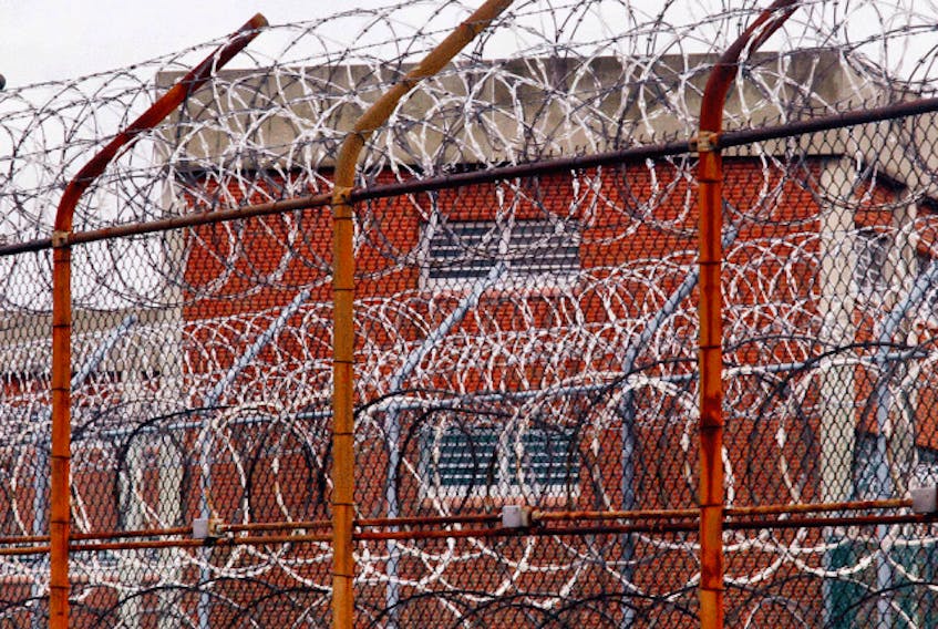  A security fence surrounds inmate housing on the Rikers Island correctional facility in New York.