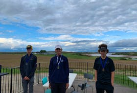 Jake Smith of Dartmouth High, centre, captured the Nova Scotia School Athletic Federation boys’ golf championship. Logan Forward, left, of Hants East was second and Jack Shaw, right, of Horton was third. Contributed