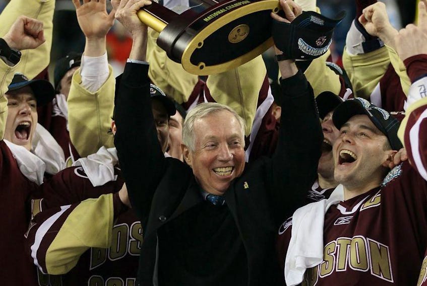Legendary Boston College coach Jerry York celebrates  
with the Eagles after winning the championship game of the 2010 NCAA Frozen Four in Detroit. York will be inducted into the Hockey Hall of Fame on Monday.  GETTY IMAGES FILE