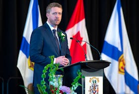 Nova Scotia Premier Iain Rankin addresses the audience after taking his oath of office in Halifax on Feb. 23. - Pool