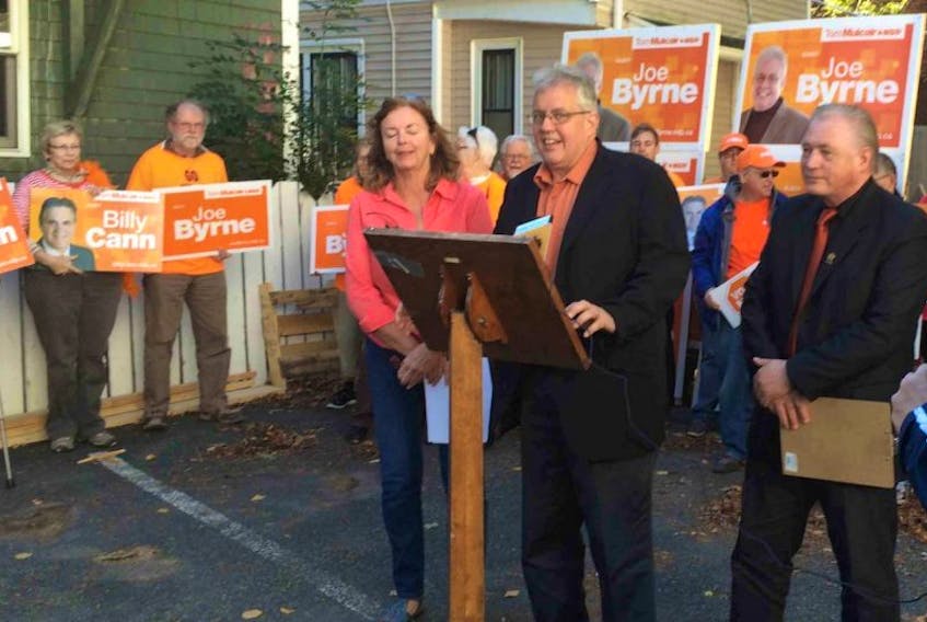 Charlottetown NDP candidate Joe Byrne, at the podium, held a press conference today to unveil the party's platform in Atlantic Canada.