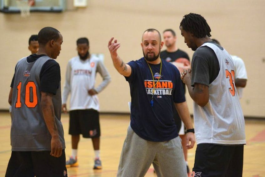 In this 2016 file photo, Island Storm head coach Joe Salerno, gives instruction to the team’s players during a practice in Charlottetown, P.E.I. In NBL Canada. coaches like Salerno (who moved to the Moncton Magic in the off-season) often have to multi-task, with scouting and player recruitment regularly being part of their duties.