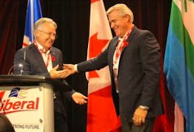 Liberal Party president John Allan and Premier Dwight Ball stand onstage together at Liberal Party convention in Gander Sept, 30, 2017. Allan called on Liberals to show unity and stand behind Ball.