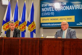 Premier Stephen McNeil and Dr. Robert Strang, Nova Scotia's chief medical officer of health, speak at a COVID-19 briefing Monday. - Communications Nova Scotia