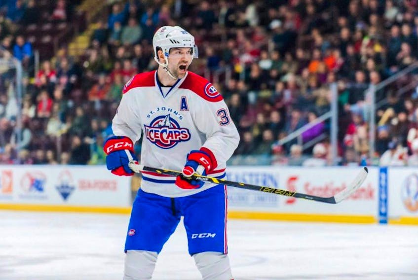 John Scott, shown in this file photo playing with the St. John's IceCaps last season, has officially announced his retirement from hockey.