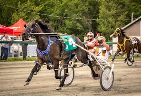 Johnnie Jack and driver Ryan Campbell held off a late challenge from Runaway Mystery and Harold LeBlanc Jr., to win the feature event in 1:57 on Saturday afternoon at Northside Downs in North Sydney. CONTRIBUTED • TANYA ROMEO