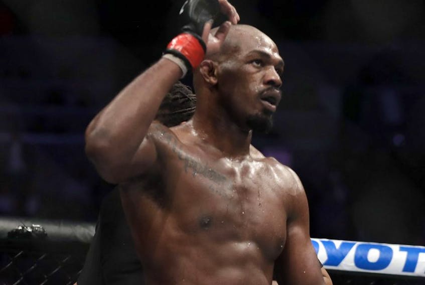 Jon Jones celebrates after defeating Anthony Smith following their light heavyweight title bout during UFC 235 at T-Mobile Arena in Las Vegas on March 2, 2019.