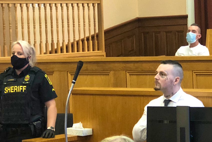Justin Wiseman awaits the start of his sentencing for armed robbery and arson in Newfoundland and Labrador Supreme Court in St. John's Wednesday afternoon.