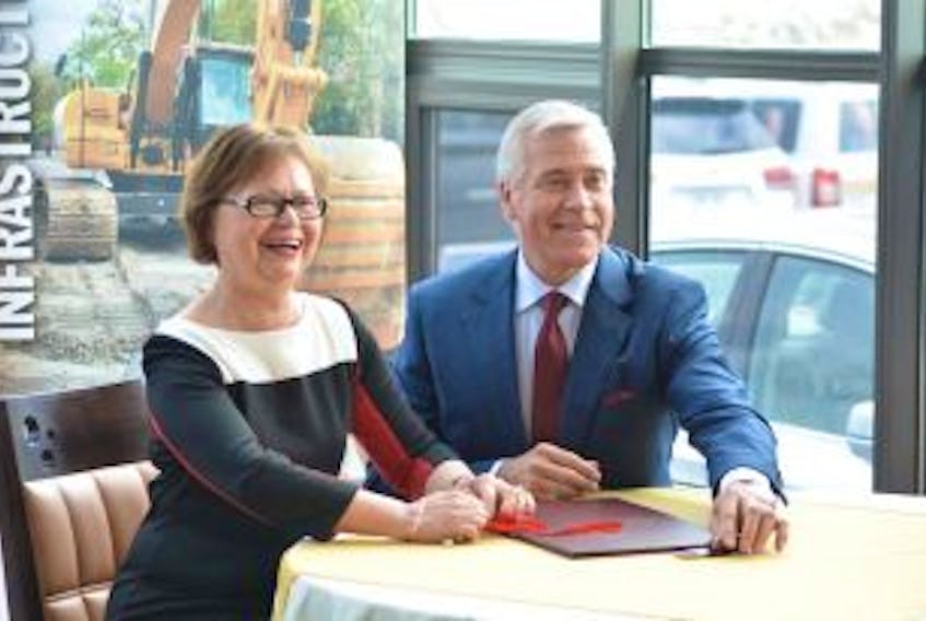 ['<p>Federal Minister of Public Services and Procurement Judy Foote (left) and Newfoundland and Labrador Premier Dwight Ball signed an agreement for water and transit infrastructure funding at the Bay Roberts Hotel Thursday afternoon.</p>']