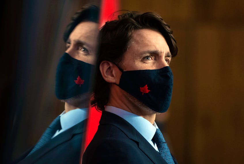 Prime Minister Justin Trudeau participates in a news conference on the COVID-19 pandemic in Ottawa, Friday, March 12, 2021.