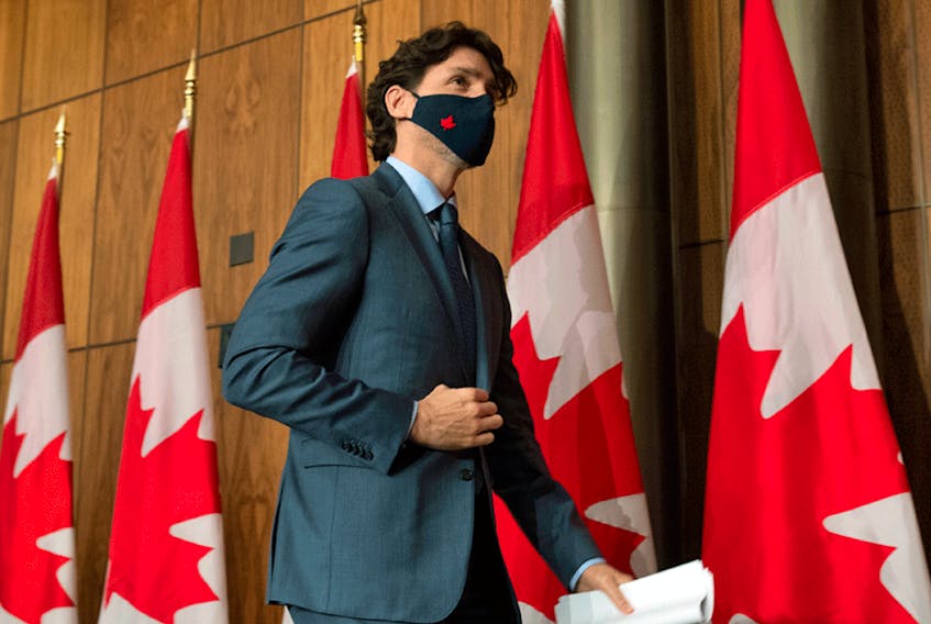 Prime Minister Justin Trudeau leaves a news conference in Ottawa on Wednesday, March 3, 2021.