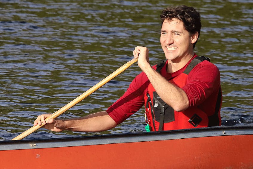 Liberal Leader Justin Trudeau paddles around in Sudbury's Lake Laurentian before vowing a new investment in camping.