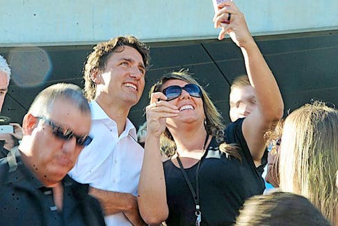 <p>Diane Crocker/The Western Star</p>
<p>A fan takes a selfie with Prime Minister Justin Trudeau as he makes his way through the crowd outside Grenfell Campus’s arts building Monday morning in Corner Brook.</p>