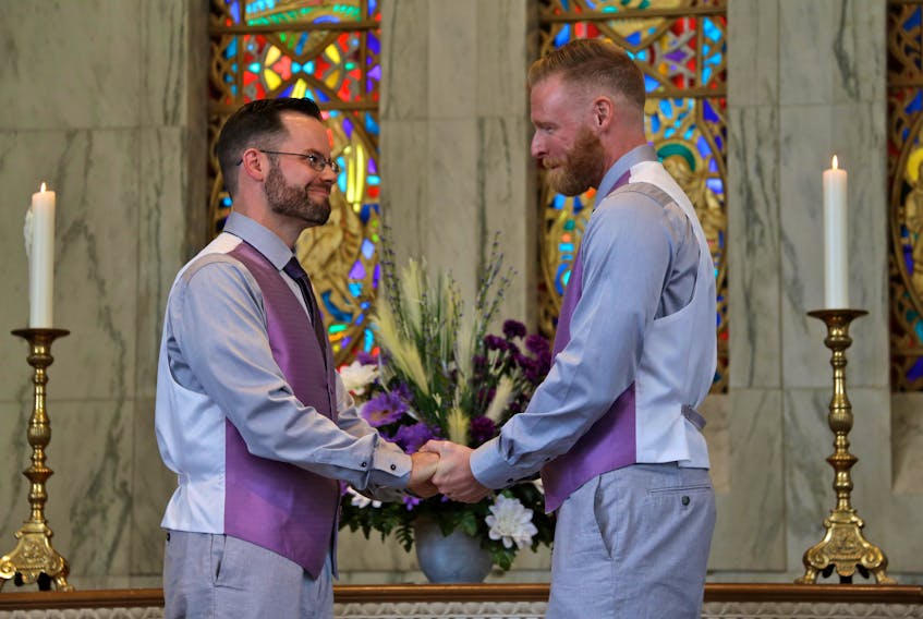 There was a hardly dry eye in the chapel where Mike Butler and Ian Brunton exchanged wedding vows and were pronounced husbands. Their July 14 wedding coincided coincidentally with Wolfville’s kickoff of Pride. (Claire Coville, Two Crows Joy Photography)