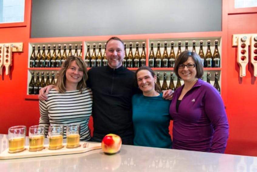 Annapolis Cider Company owners Sean Myles and Gina Haverstock are flanked by Katie Barbour, left, a beverage industry veteran and cider maker Melanie Eelman, who has a PhD in chemistry from Dalhousie University.