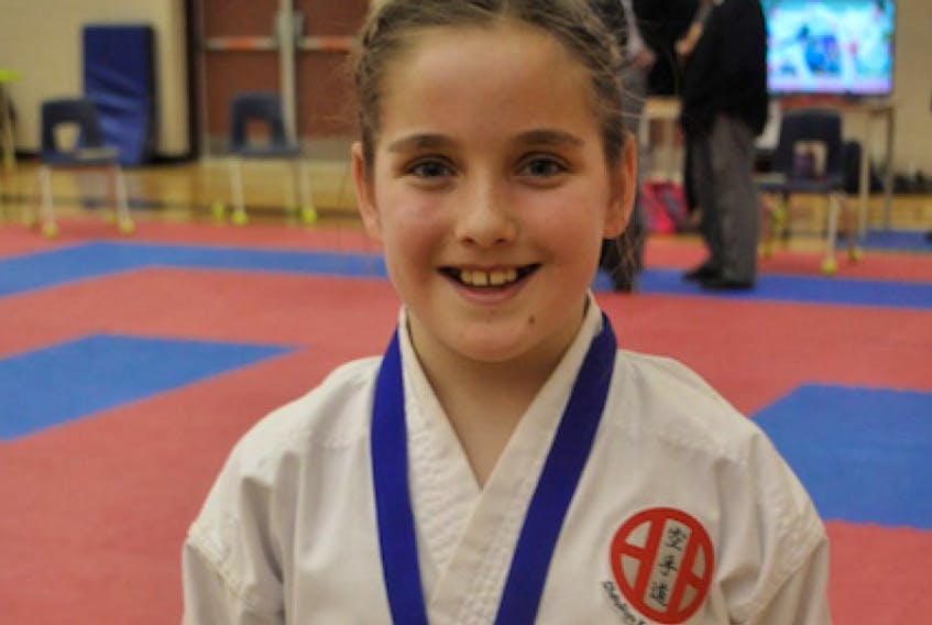 Kailyn Beaton of the Windsor Karate Club was pleased by her gold medal on April 8.