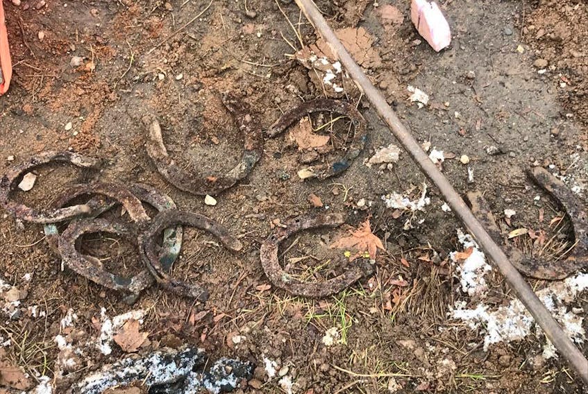 Several old horseshoes and other artifacts were recently unearthed by a work crew digging up the sidewalk in preparation for the Cornwallis River bridge replacement in Kentville. - Town of Kentville photo