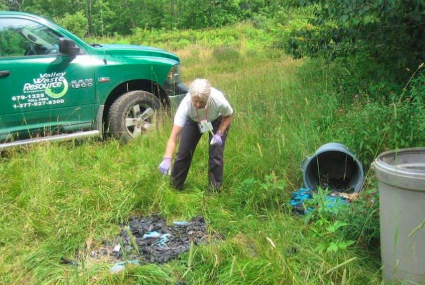 Bylaw enforcement officer Grace Proszynska is having to deal with 200 bags full of excrement dumped in the Gaspereau area this week.