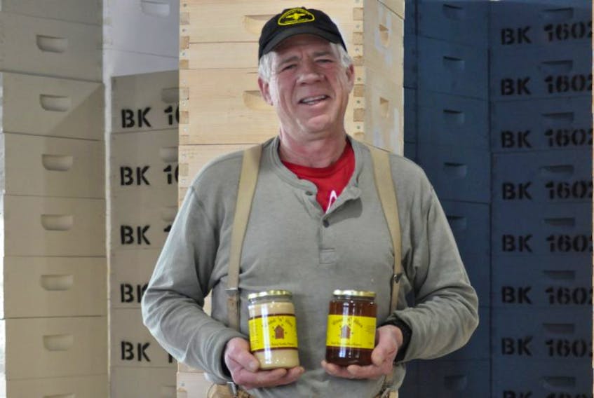 Alex Crouse, pictured standing in Wood ‘n’ Hive’s workshop, plans to nearly double the number of hives at his Port Williams-based operation by spring.