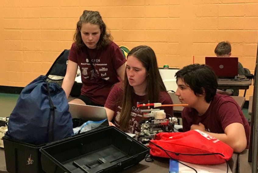 The Horton High School Robats took part in their second Robotfest World Championships last month. Margaret Hopkins, left, Anna Joy Aylward Burgess and Lydia Wilks made every second count.