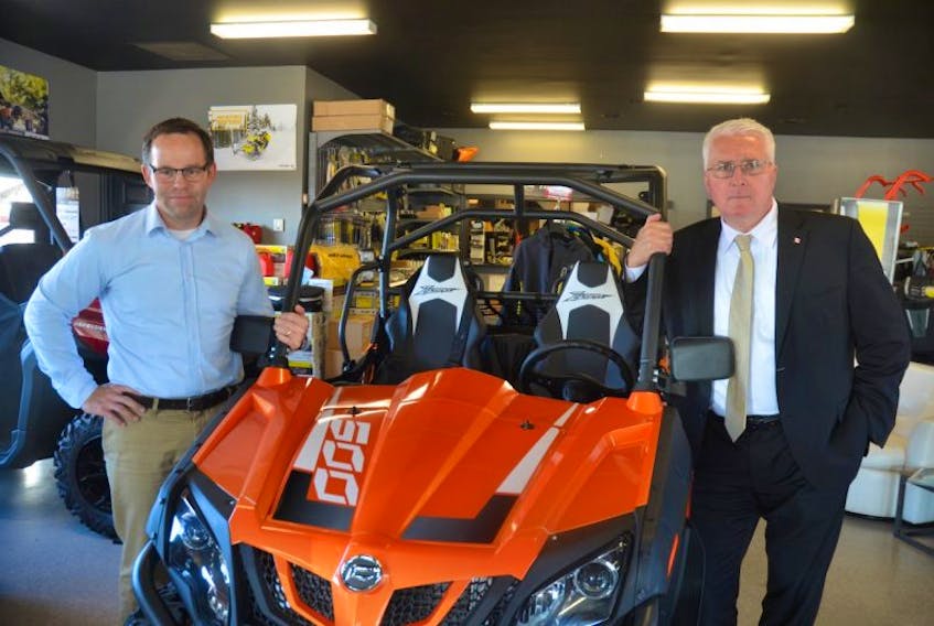 Go Power Sports owner Greg Foran is concerned how proposed tax law changes will affect his enterprise and other small and medium businesses. Deputy Opposition Whip John Brassard, Conservative MP for Barrie-Innsisfi, Ontario, visited on Oct. 5 to discuss those concerns.