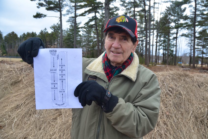 Centreville Park and Recreation Association president George Graves with the plan for a BMX bike track that will soon be added to the Centreville Community and District Park complex.