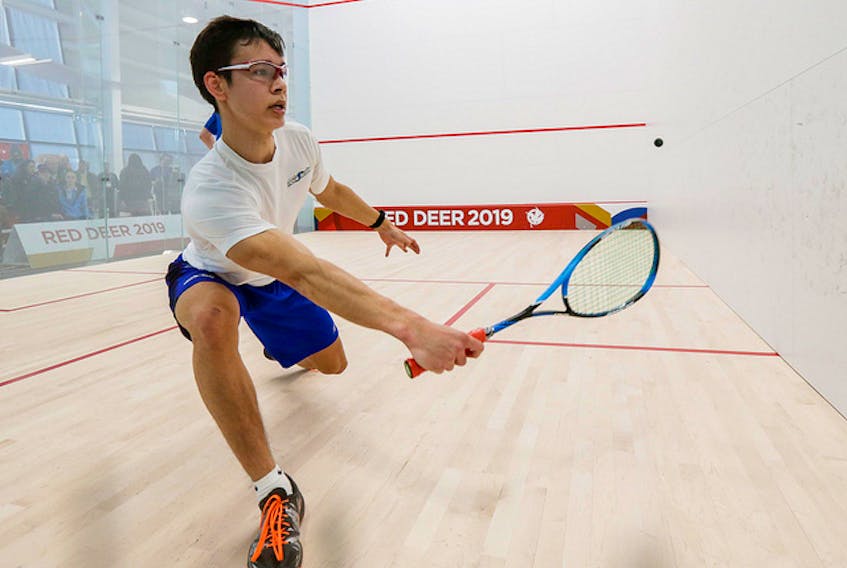 Douglas Kosciukiewicz of Canaan takes on Sam Scivier of British Columbia in the male individual squash bronze medal match in at the Gary W. Harris Canada Games Centre in Red Deer, Alberta.